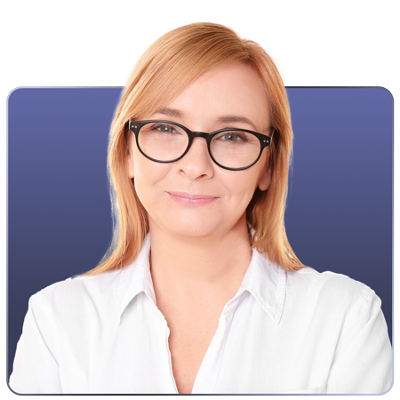 A smiling woman with blonde hair and glasses, wearing a white shirt against a blue background.